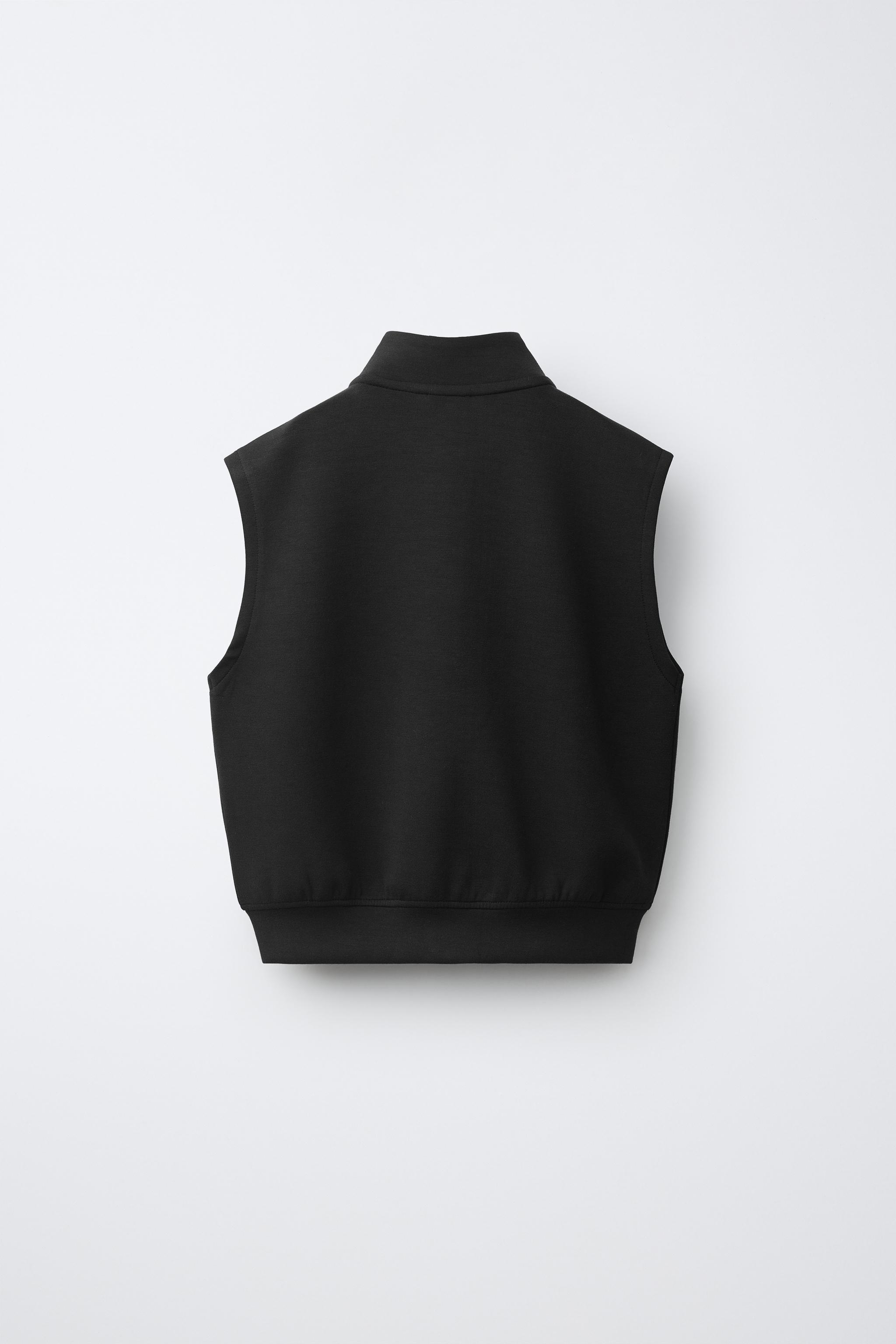 GILET INTERLOCK À ÉTIQUETTE